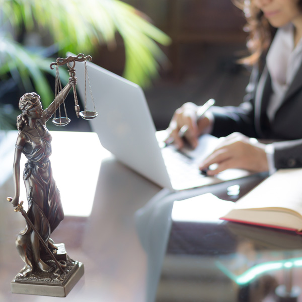 female lawyer on laptop